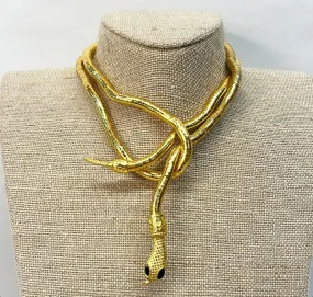 80’s sculptural style gold metal omega look that can be twisted and shaped into a necklace