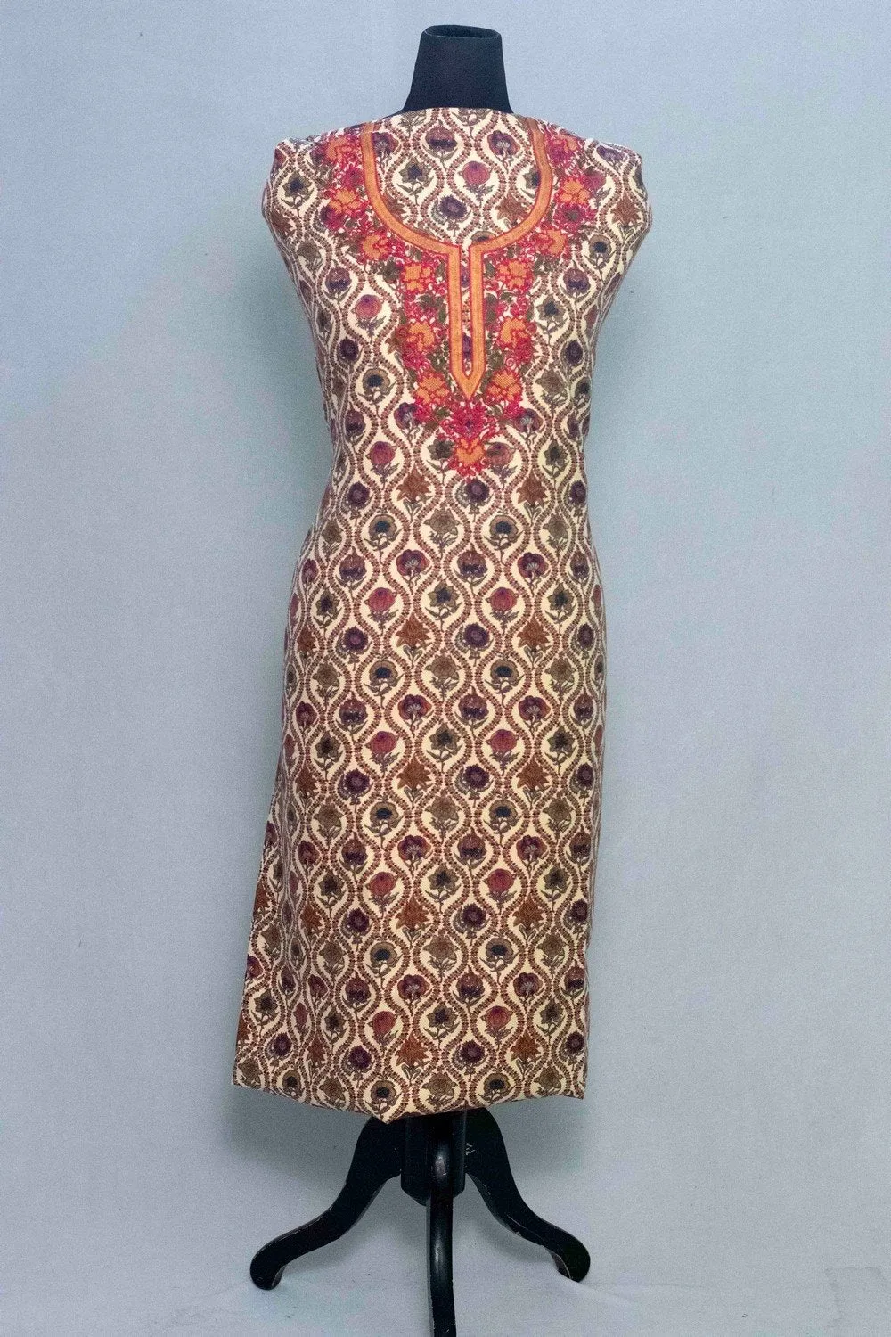 Cream Colour Woolen Kani Printed Suit With Neck And Over All Magical Print Provide Elegance.