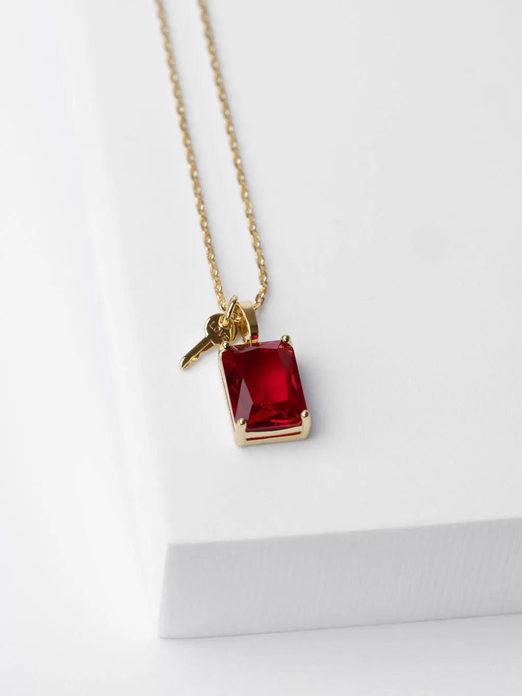 Emerald Cut Gemstone and Mini Key Necklace in Gold